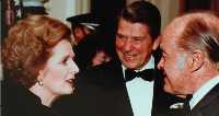 Margaret Thatcher talking to Bob Hope and Reagan