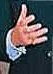hand in suit reaching out