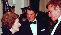 Margaret Thatcher talking to Charlton Heston and Reagan